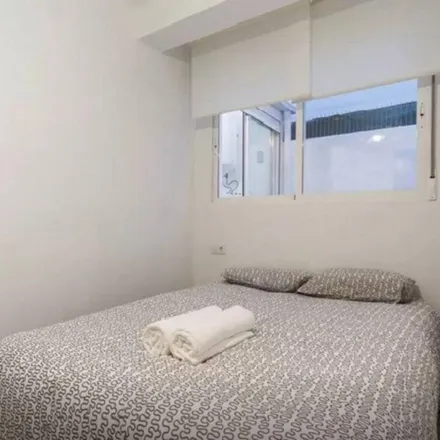 Rent this 9 bed apartment on Carrer de Rodrigo de Pertegàs in 46023 Valencia, Spain