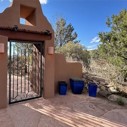 Buy this 3 bed house on 37 Camino Quien Sabe in Santa Fe County, NM 87505