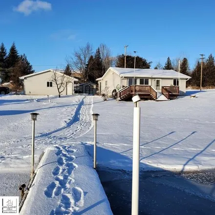 Buy this 2 bed house on 3034 Phelps Lake Road in Dayton Township, MI 48744