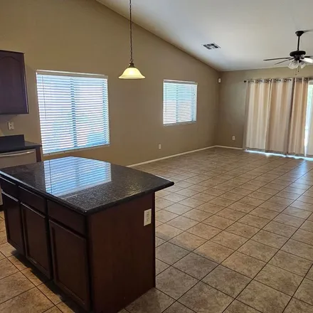 Rent this 3 bed apartment on 3295 South 257th Drive in Buckeye, AZ 85326