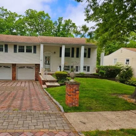 Buy this 4 bed house on 26 Colonial Woods Drive in West Orange, NJ 07052