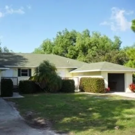 Rent this 2 bed house on 10711 Holly Road in Pine Island Center, Lee County