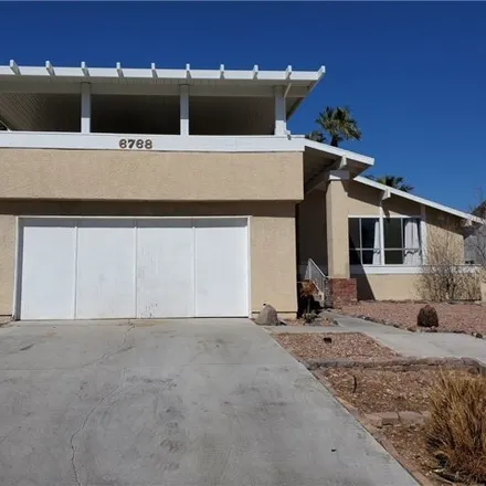 Rent this 4 bed house on 6778 Green Grove Drive in Spring Valley, NV 89103