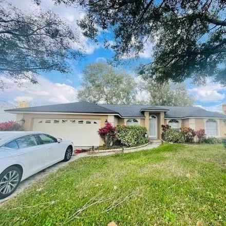 Rent this 4 bed house on 7452 Herrick's Loop in Orange County, FL 32835