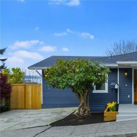 Buy this 4 bed house on 3631 59th Avenue Southwest in Seattle, WA 98116