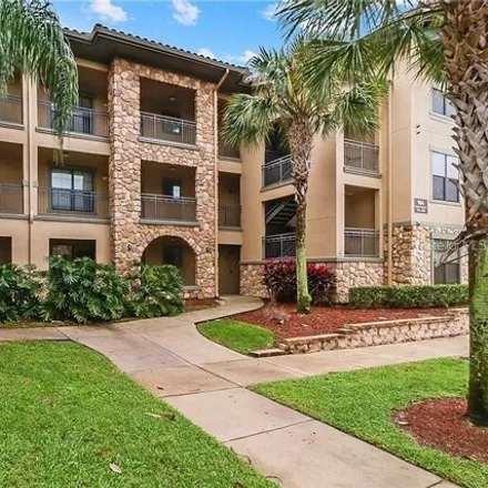 Rent this 3 bed condo on 938 Charo Parkway in Polk County, FL 33897