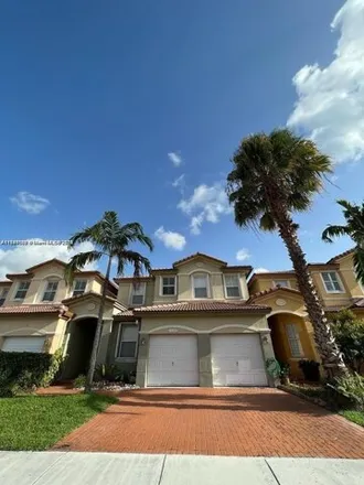 Rent this 4 bed townhouse on 11300 Northwest 74th Terrace in Medley, Miami-Dade County