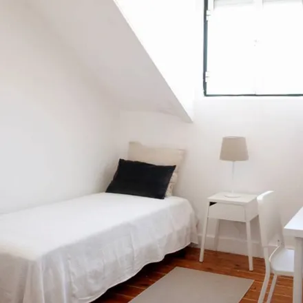 Rent this 4 bed room on Jardim Avelar Brotero in Rua Filinto Elísio, 1300-375 Lisbon