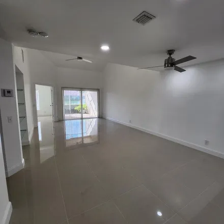 Rent this 4 bed apartment on 7353 Northwest 61st Terrace in Parkland, FL 33067
