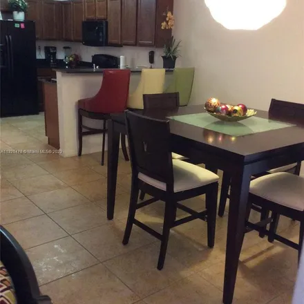Rent this 2 bed apartment on 8899 Northwest 107th Court in Doral, FL 33178