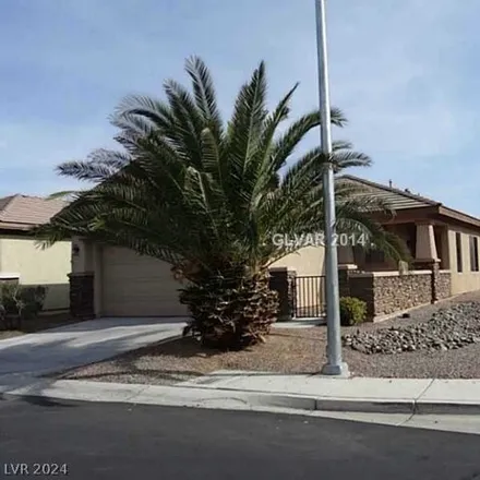 Rent this 3 bed house on Rustic Sunset Way in Whitney, NV 89122