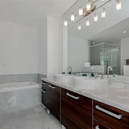 Rent this 3 bed apartment on T-Mobile in 244 Biscayne Boulevard, Torch of Friendship