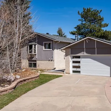 Buy this 4 bed house on Flora Way in Lakewood, CO 80410