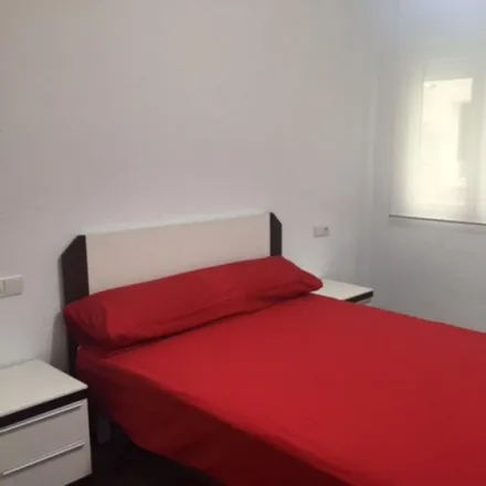Rent this 4 bed room on Madrid in Calle Nardos, 4