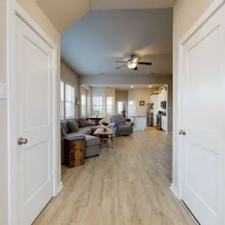 Rent this 4 bed apartment on 6030 Rivercane Way in Elyson, Katy