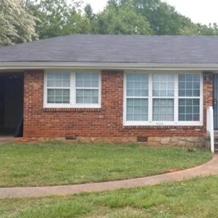 Rent this 3 bed house on 1413 Columbia Drive in Belvedere Park, GA 30032