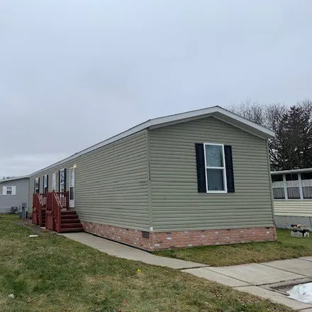 Buy this studio apartment on 17011 Oliver Drive in Macomb Township, MI 48044