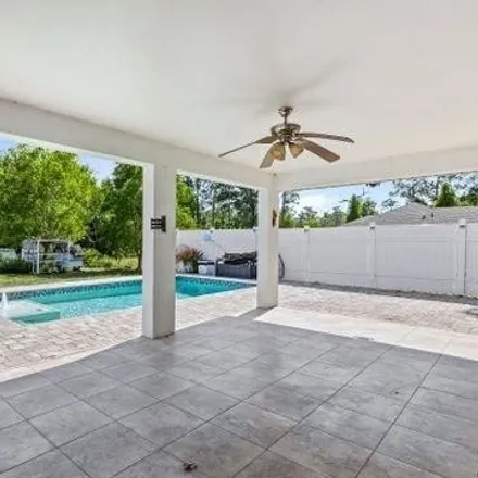 Buy this 3 bed house on 3510 29th Ave Ne in Naples, Florida