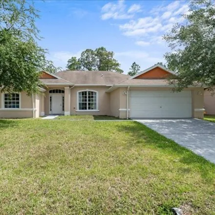 Buy this 4 bed house on 998 Kenmore Street Northwest in Palm Bay, FL 32907