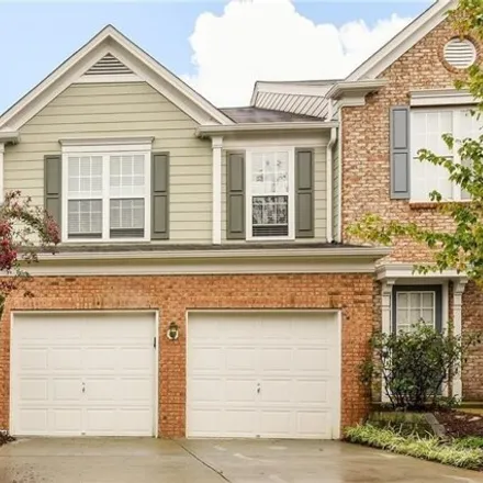 Rent this 3 bed townhouse on Gainesway Court in Adams Crossroads, Gwinnett County