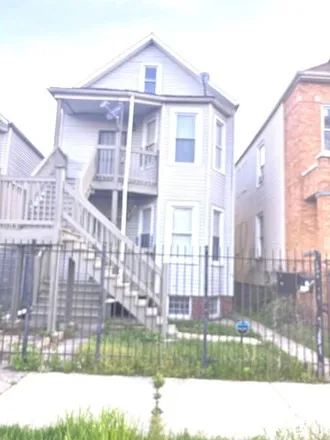 Buy this 3 bed house on 2034 West 52nd Place in Chicago, IL 60609