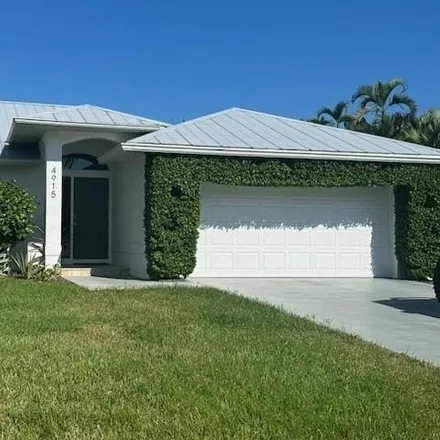 Rent this 3 bed house on 4959 Southwest 27th Avenue in Cape Coral, FL 33914
