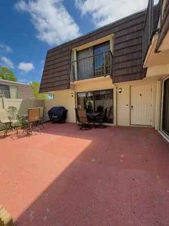 Buy this 2 bed townhouse on North Military Trail in West Palm Beach, FL 33417