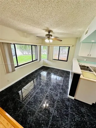 Rent this 2 bed condo on 4730 Sw 62nd Way Apt 104 in Davie, Florida