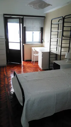 Rent this 5 bed room on Rua da Ilha Terceira 41 in 1000-172 Lisbon, Portugal