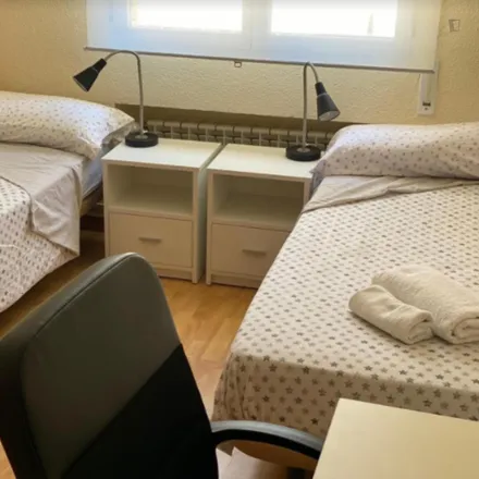 Rent this 6 bed room on Madrid in Farmacia - Calle San Basilio 24, Calle de San Basilio