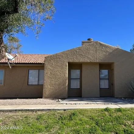 Buy this 2 bed townhouse on 3511 East Baseline Road in Phoenix, AZ 85042