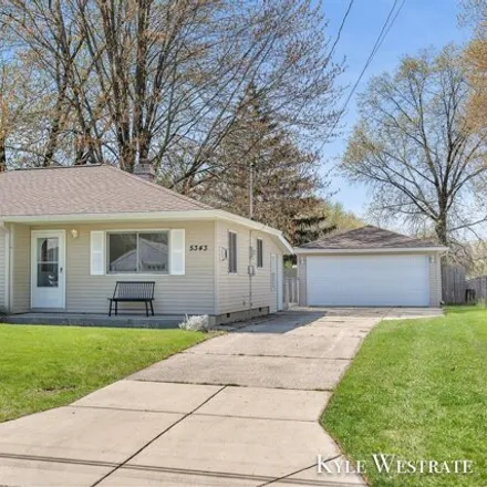 Buy this 3 bed house on Southeast Kelloggsville Elementary School in 240 52nd Street Southeast, East Grand Rapids