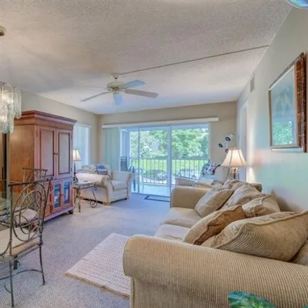 Rent this 2 bed condo on 19 Highpoint Circle West in Collier County, FL 34103