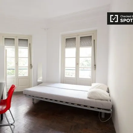 Rent this 7 bed room on Rua Passos Manuel 96 in 1150-285 Lisbon, Portugal