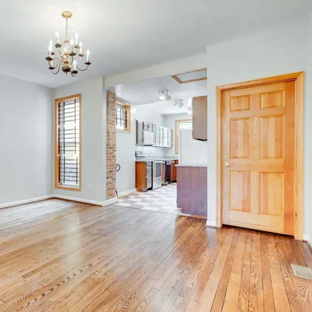 Rent this 4 bed townhouse on 2704 Guilford Avenue in Baltimore, MD 21218