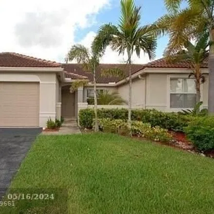 Rent this 3 bed house on 1949 Cygnus Court in Weston, FL 33327