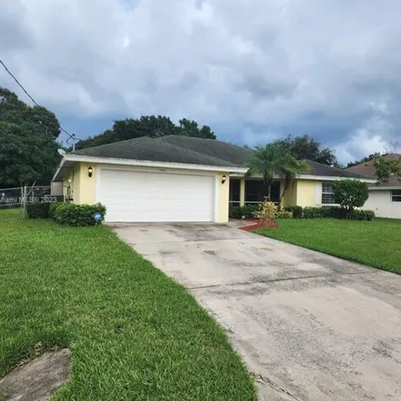 Rent this 4 bed house on 5438 Hickory Drive in Indian River Estates, Saint Lucie County