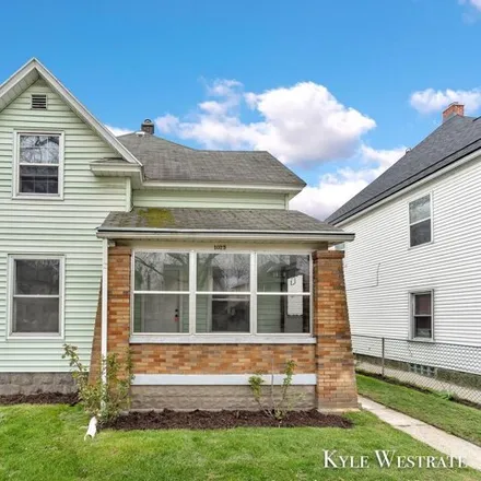 Buy this 4 bed house on 1039 Sheridan Avenue Southwest in Grand Rapids, MI 49503