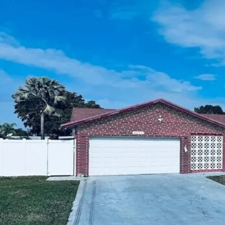 Rent this 3 bed house on 6627 Northwest 96th Terrace in Tamarac, FL 33321