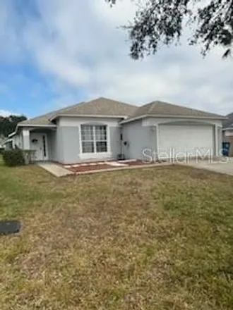 Rent this 4 bed house on 1738 Clubhouse Cove in Haines City, FL 33844