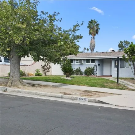 Rent this 4 bed house on 12212 Bradford Place in Los Angeles, CA 91344