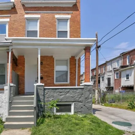 Buy this 3 bed townhouse on 1120 N Lakewood Ave in Baltimore, Maryland