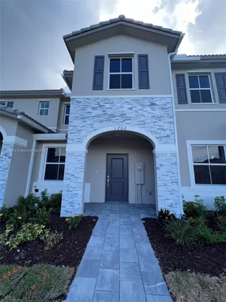 Rent this 3 bed townhouse on 2518 Southeast 20th Place in Homestead, FL 33035
