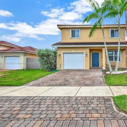 Rent this 4 bed house on 8986 SW 214th Terrace