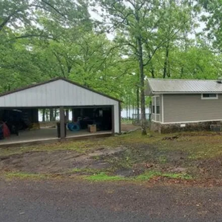 Buy this studio apartment on 88 Air Road in Cleburne County, AR 72067