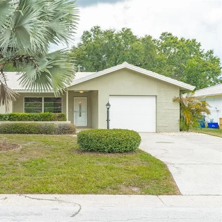 Buy this 2 bed house on 2545 Bramblewood Drive East in Mecca, Palm Harbor
