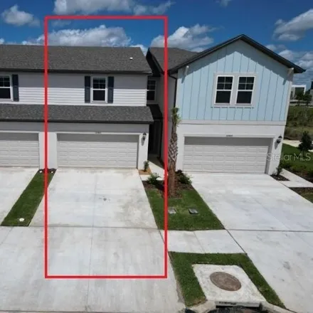 Rent this 3 bed townhouse on Limitless Place in Pasco County, FL 33545