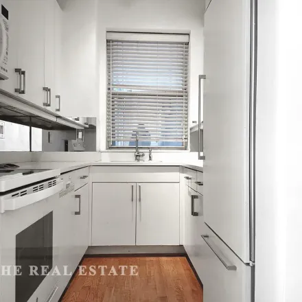 Rent this 2 bed apartment on 40 West 55th Street in New York, NY 10019