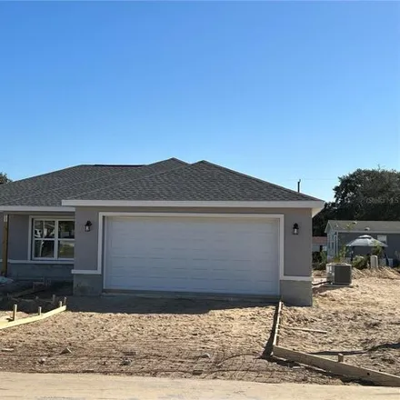 Buy this 3 bed house on 9498 Southeast 162nd Place in Marion County, FL 34491