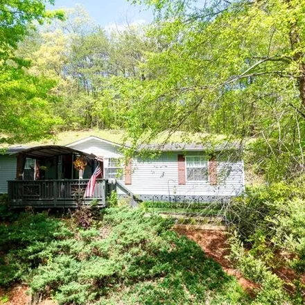 Buy this studio apartment on 1 Sweet River Valley Road in Jackson County, NC 28779